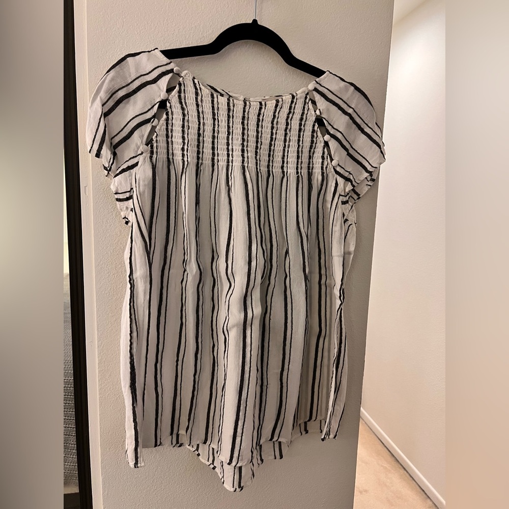 Light weight short sleeved black and white shirt.